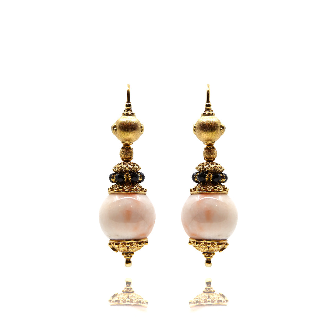 Yellow gold ear jewelry with coral and onyx
