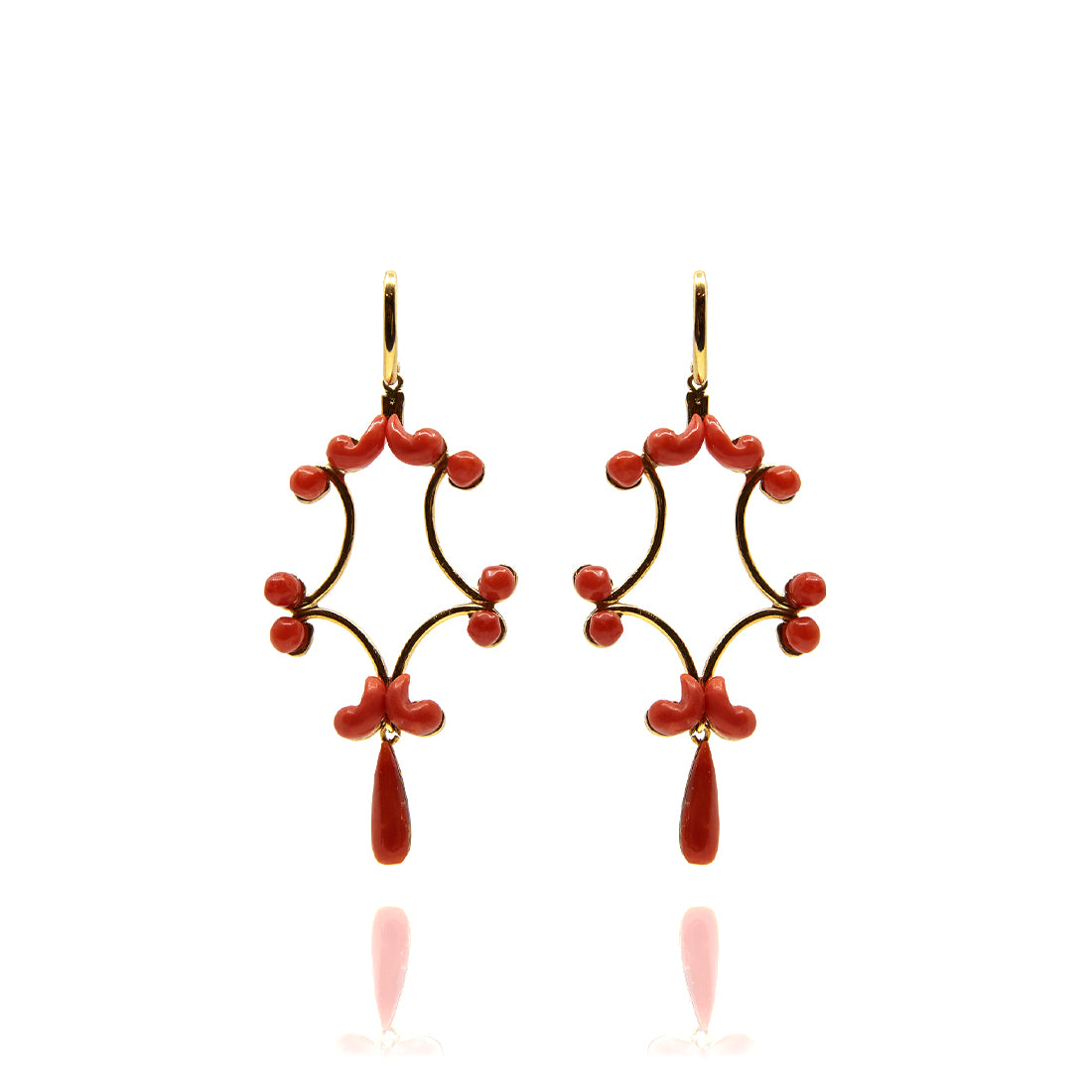 Yellow gold ear jewelry with coral