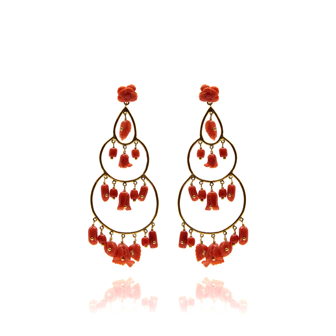 Yellow gold ear jewelry with coral