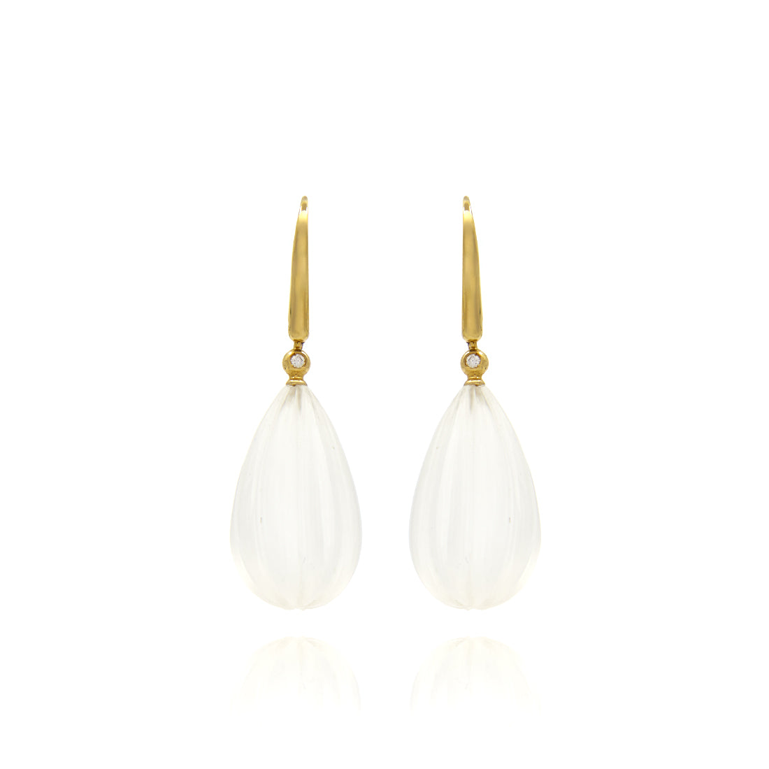 Yellow gold ear jewelry with rock crystal