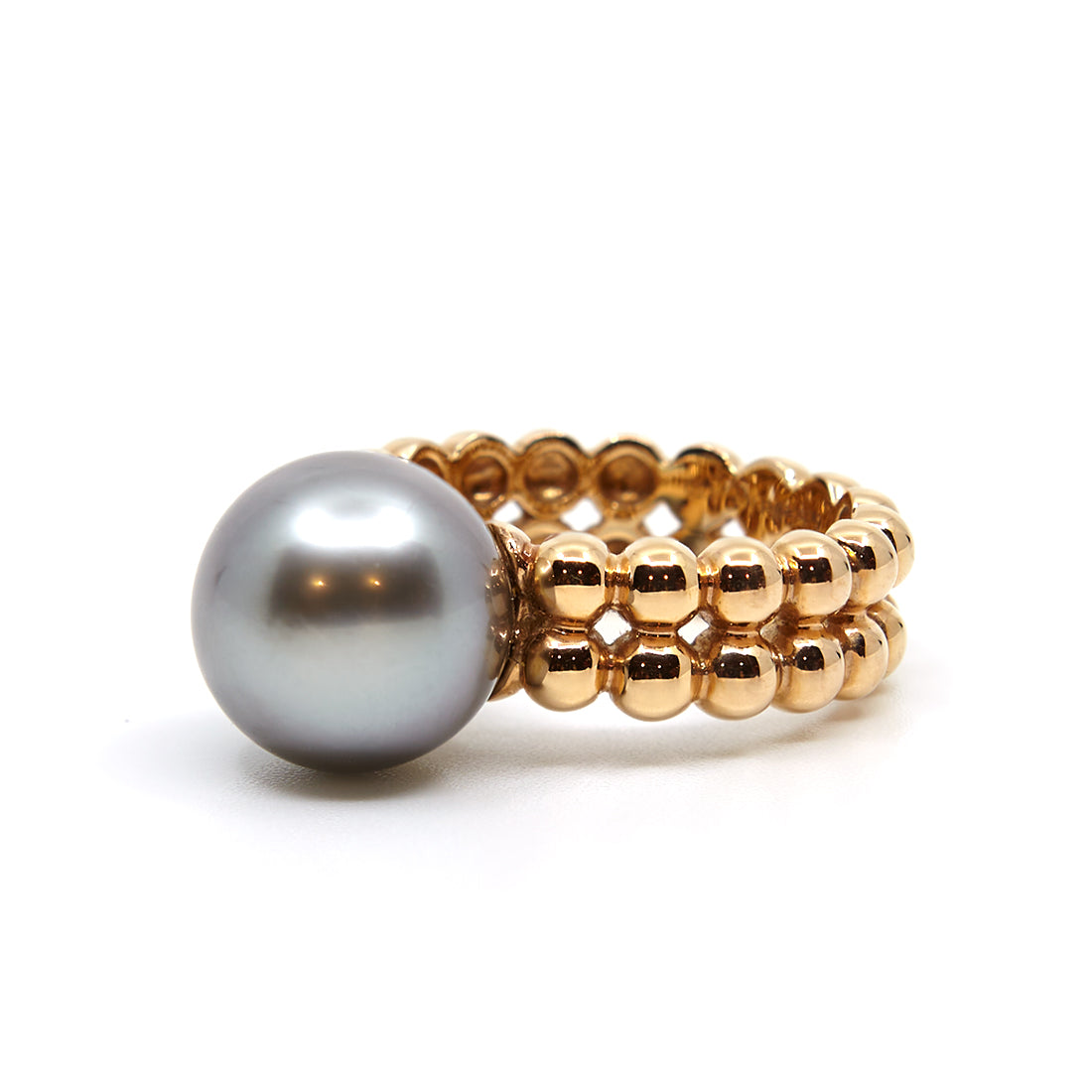 Roségoldener Ring mit Tahiti-Perle und einer Schiene aus Kugeln.