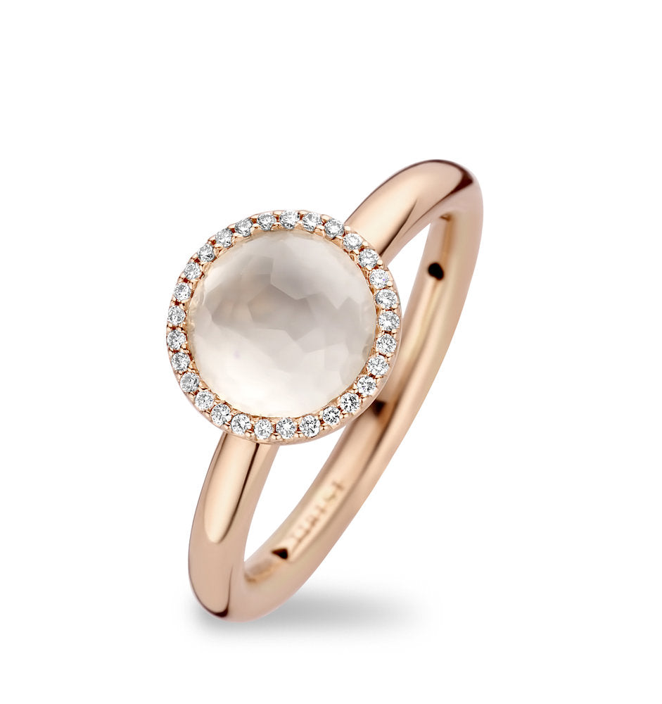 Rose gold ring with diamond with mother of pearl and quartz.