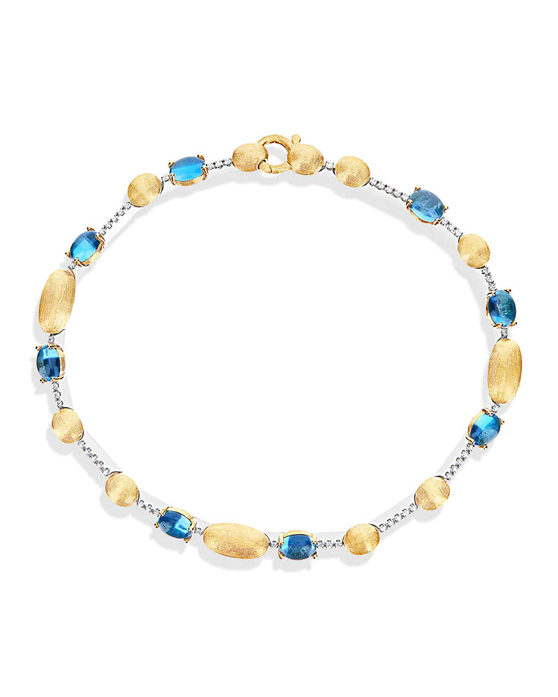 Geelgouden armband met london blue topaas en diamant ''Azure''