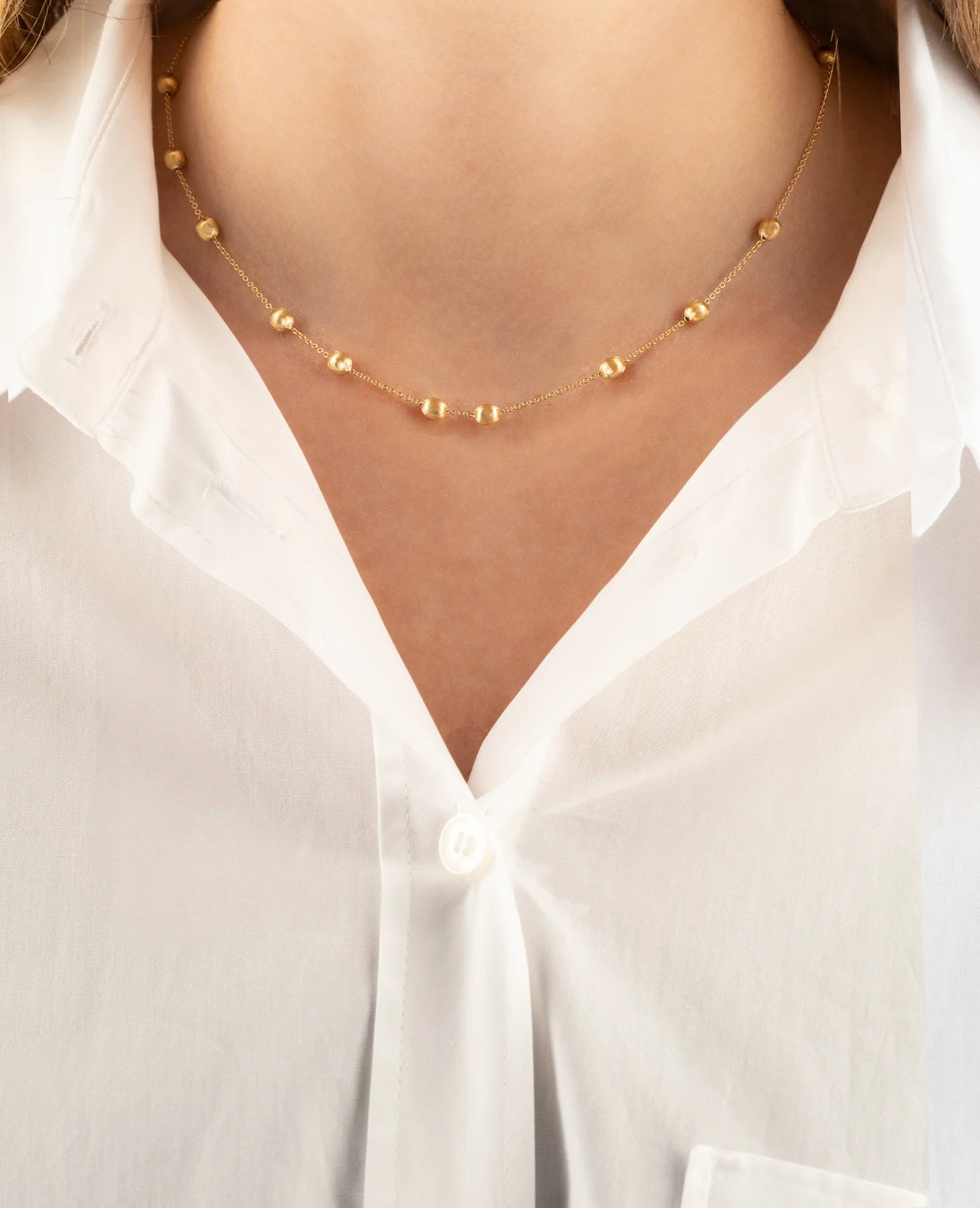 Halskette aus Gelbgold mit eingravierten Kugeln „Soffio“ 