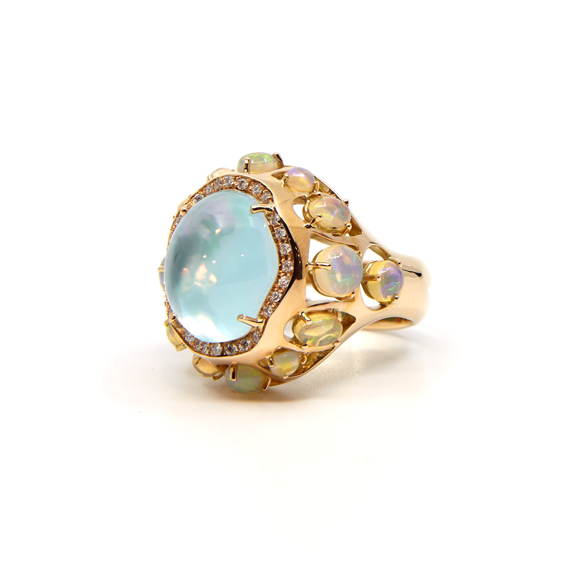 Rose gold ring with an Ethiopian opal, mother of pearl, diamond and turquoise