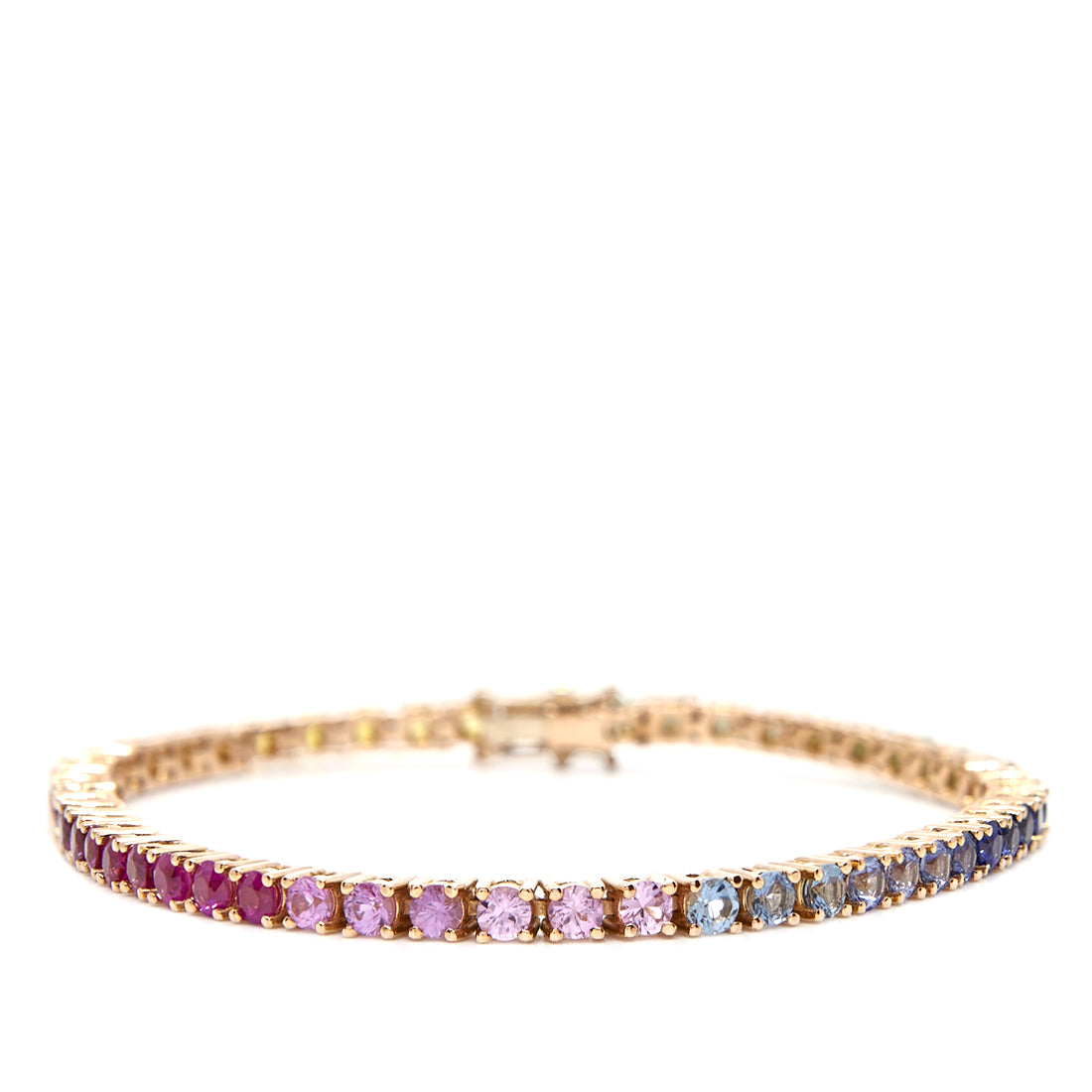 Rose gold rainbow bracelet with sapphire.
