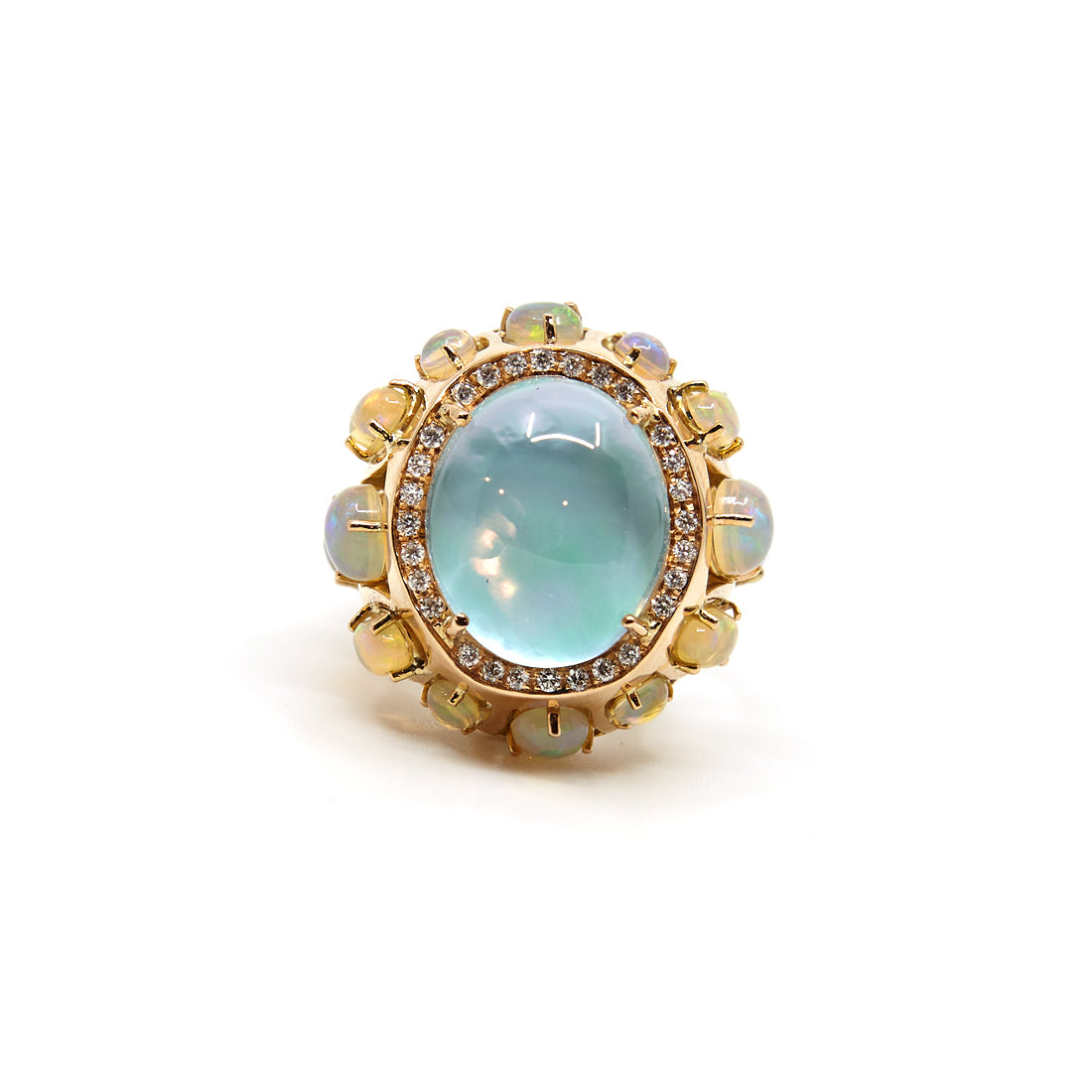 Rose gold ring with an Ethiopian opal, mother of pearl, diamond and turquoise