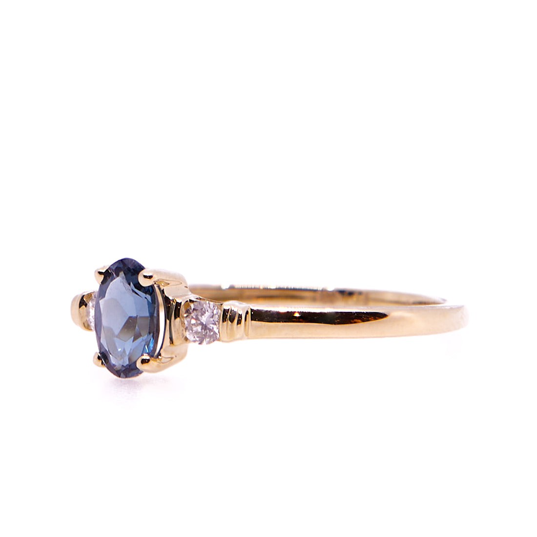 Geelgouden ring met london blue topaas