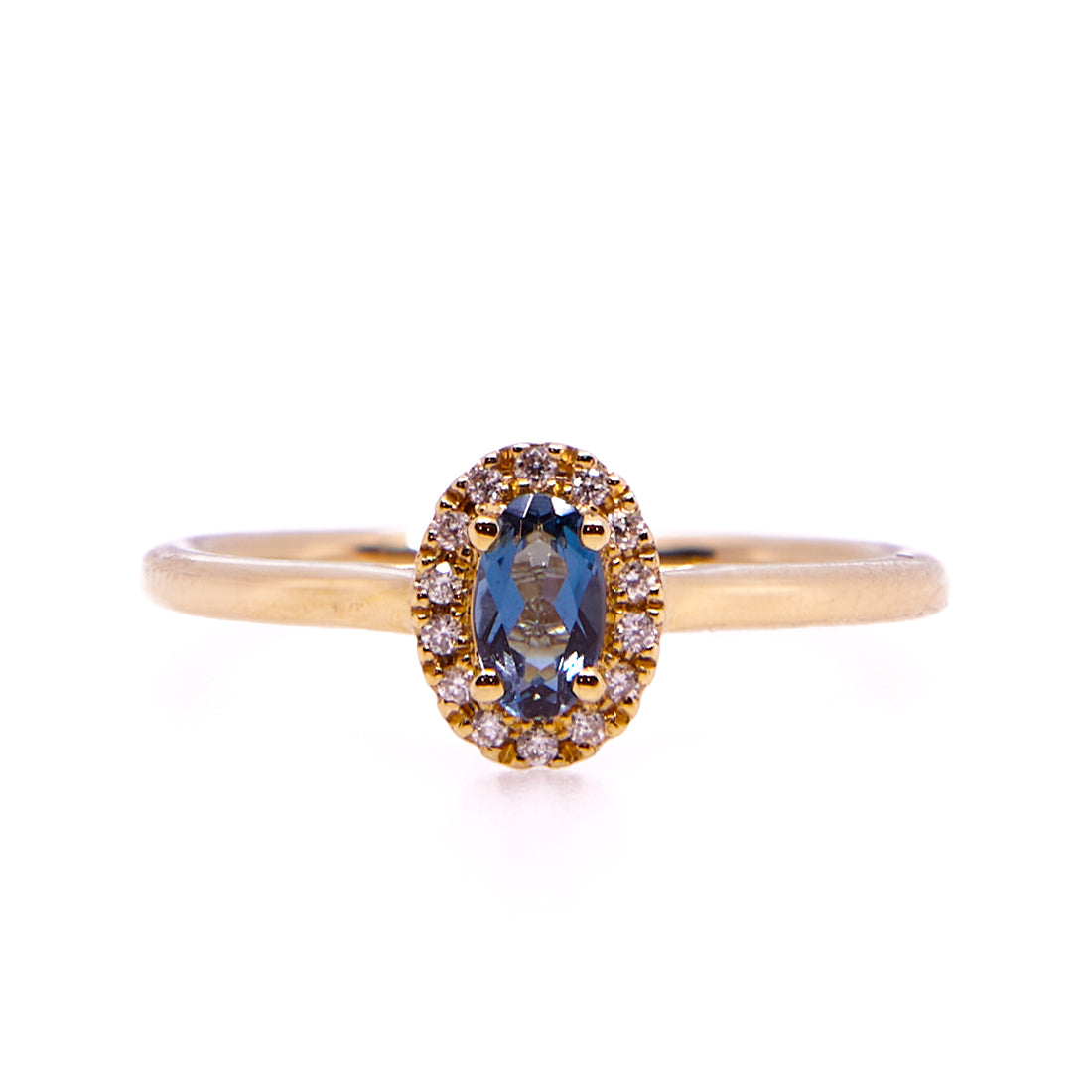 Geelgouden entourage ring met London blue topaas